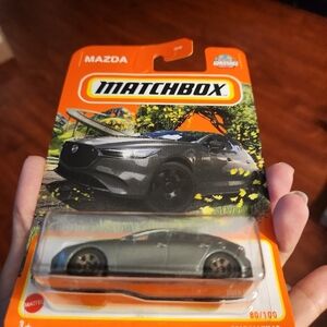 Match Gray Mazda Toy Car